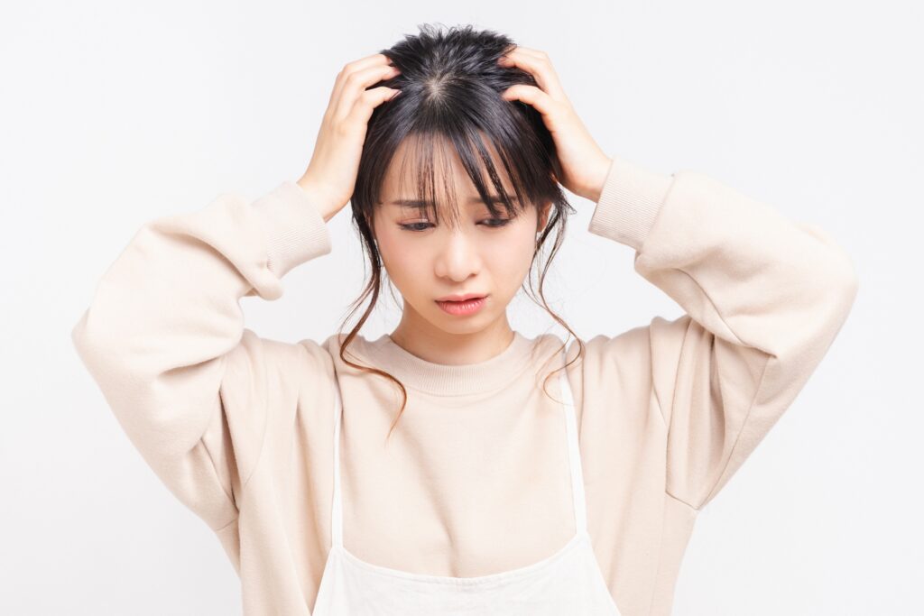 腸活が続かなくて頭を抱えている女性